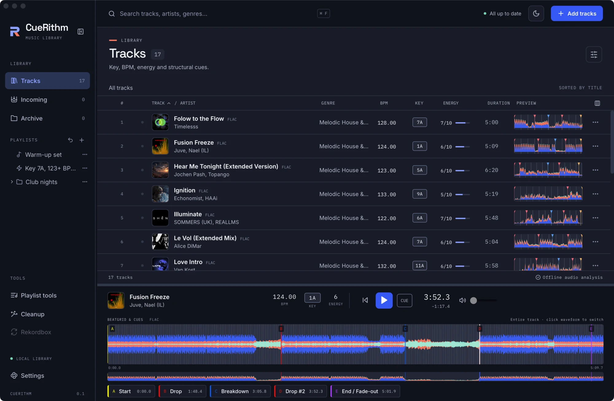 CueRithm showing a track library with key, BPM and energy columns above a colour waveform with five labelled cues